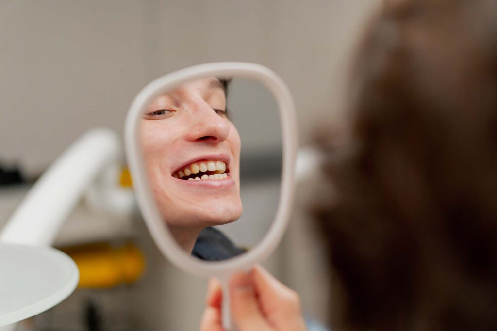 Close-Up-Dental-Office-A-Young-Guy-Sits-In-Chair-A-Lczttp4.Jpg